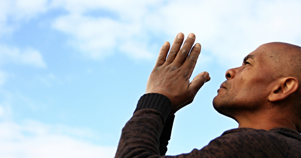 in-text image of a person praying