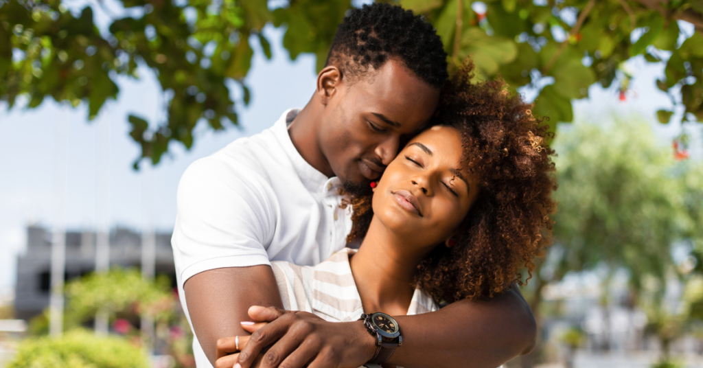 a black couple share a warm and loving embrace